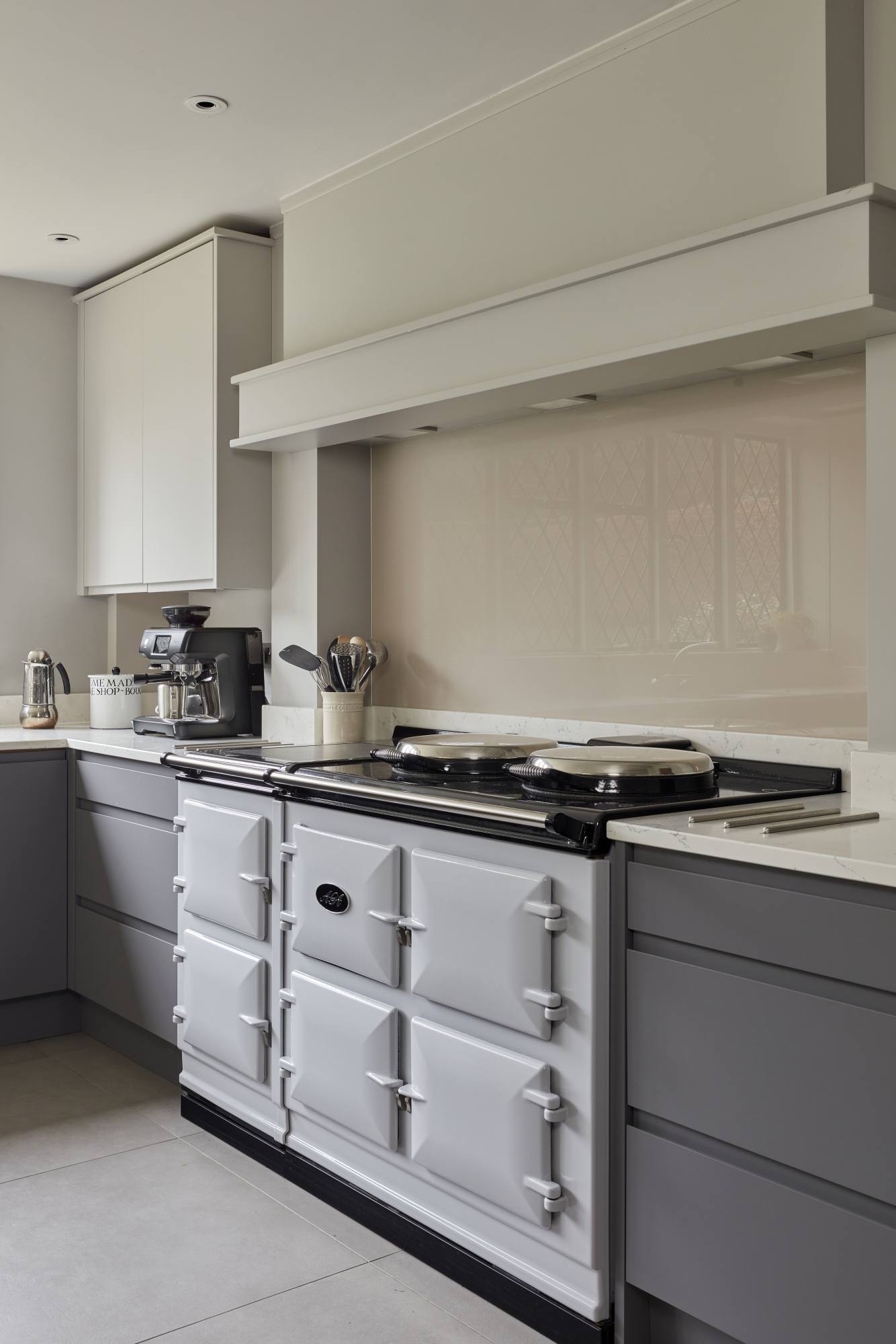 Stylish grey AGA with coffee station in a luxury Surrey manor house kitchen.